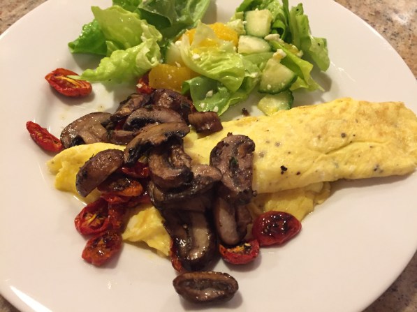 omelet with roasted mushrooms and tomatoes