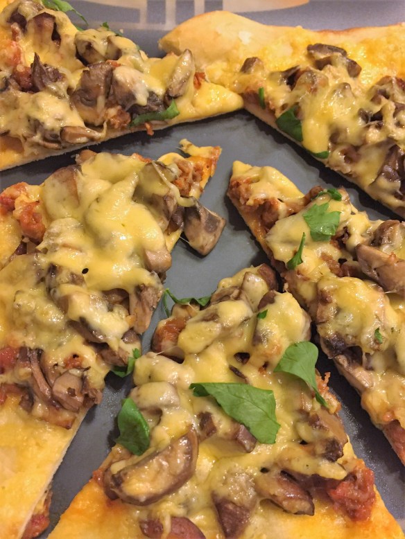 mushroom sausage pizza
